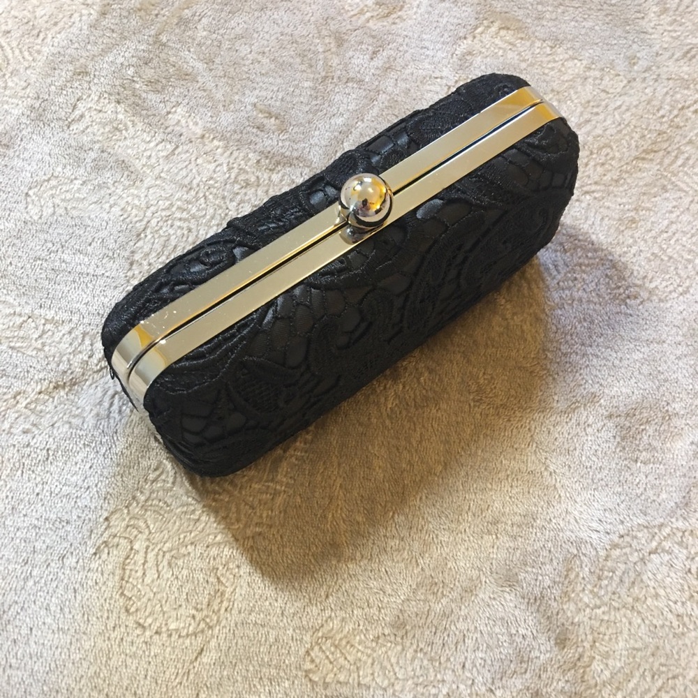 Ricki’s small black clutch purse bag chain embroidered